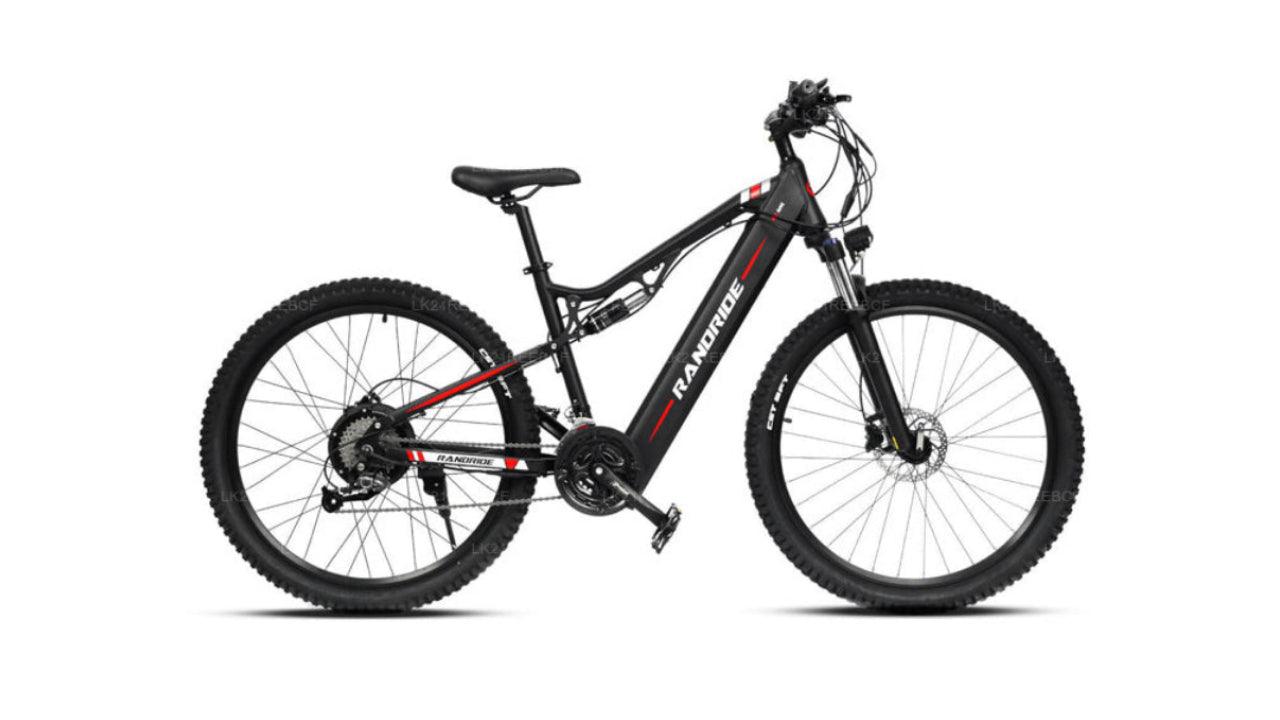 Black electric bike with red accents on a white background