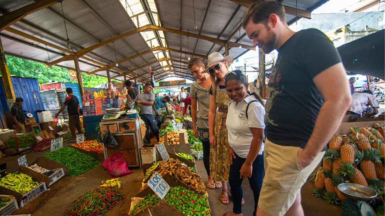 Tour del mercato e lezione di cucina da Colombo